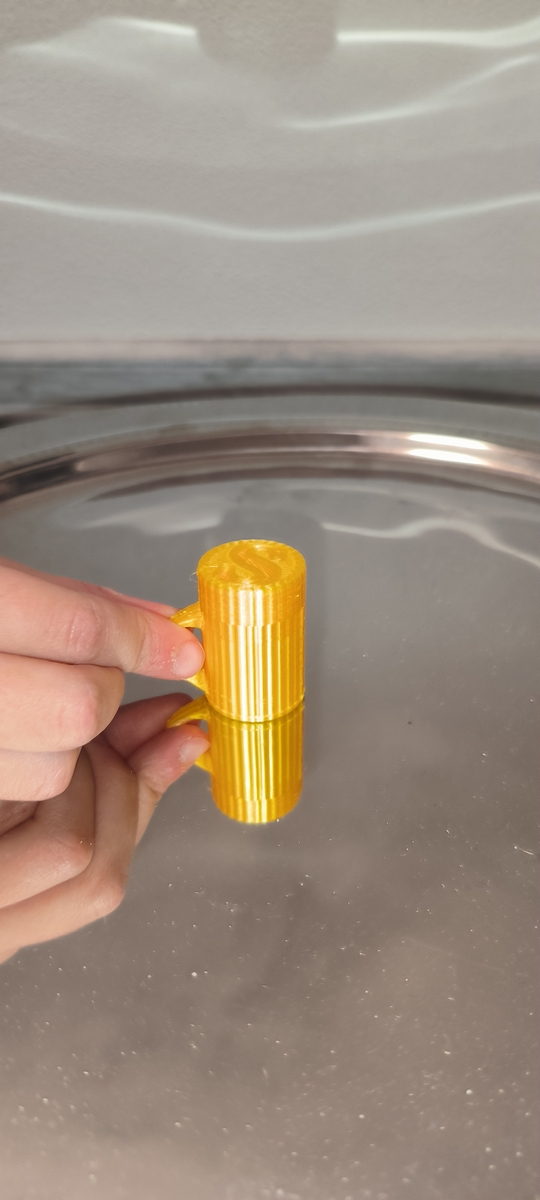 Cestovní nádobka na sypké materiály na klíče - design zlatého piva